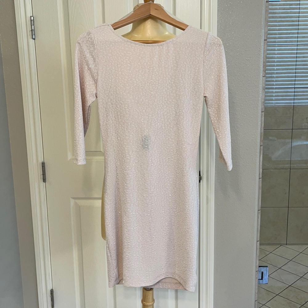 Nude long sleeve, backless dress